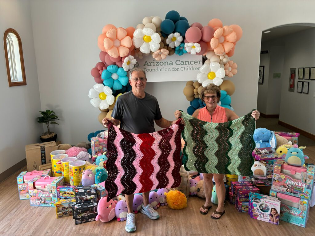 SMILES Volunteers Chris and Robin Ensign delivering hundreds of gifts in late April, 2026.